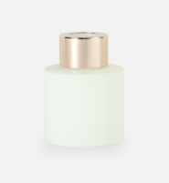 kleurrijke glazen geurverspreiders met houten en gouden doppen van LOVI studio.